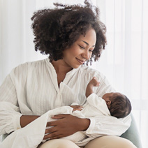 Black mother holding a newborn