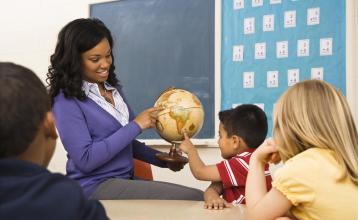 Early childhood educator in classroom of young learners