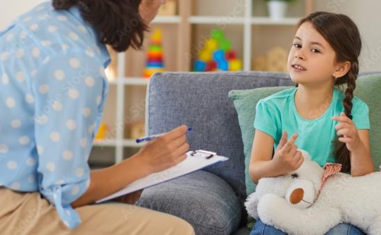 Social worker interviewing child