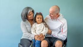 Older caregivers with a child on their lap